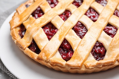 Delicious fresh cherry pie on tray, closeup