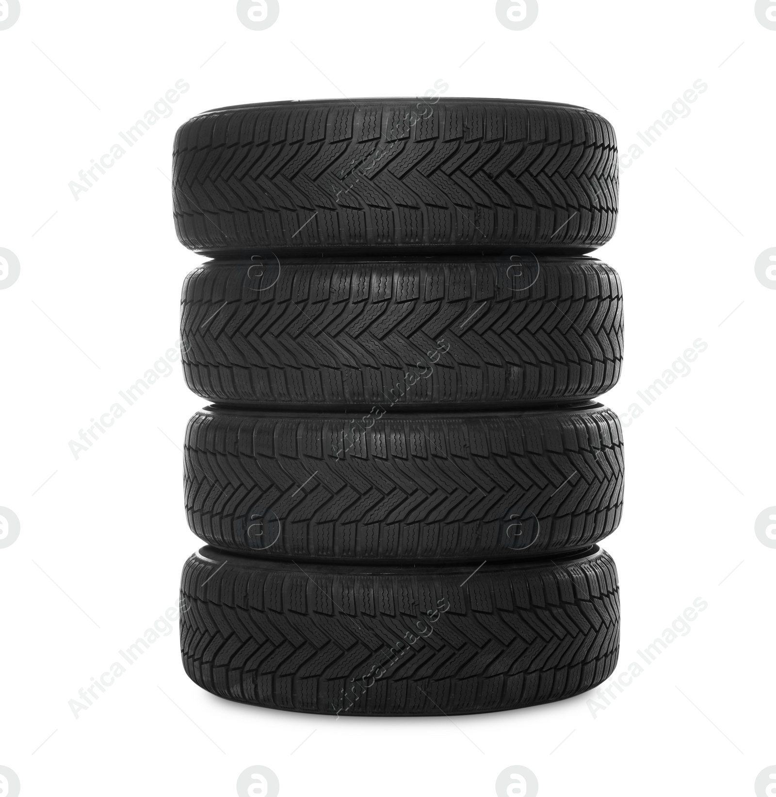 Photo of Set of new winter tires on white background