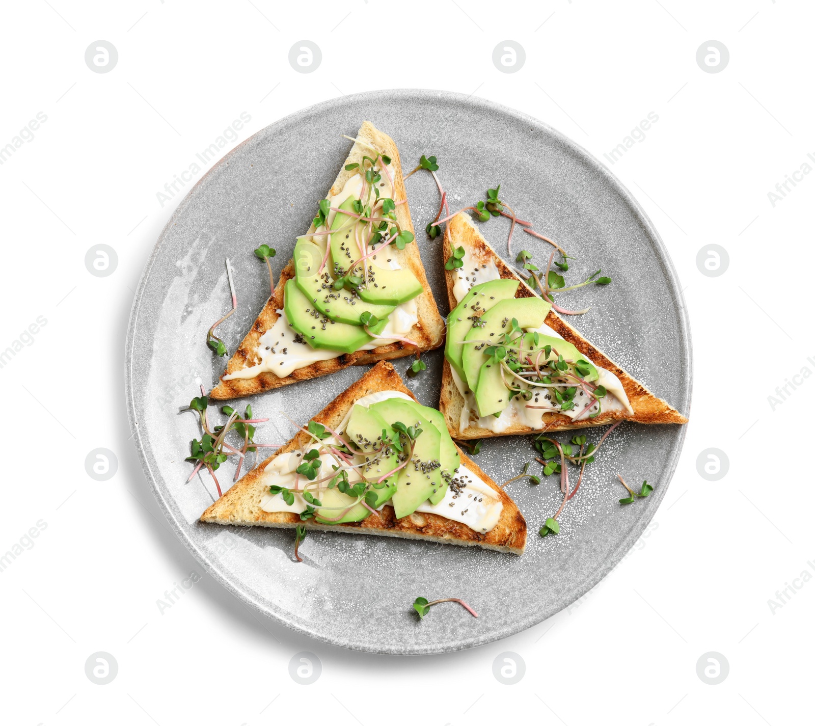 Photo of Plate of tasty toasts with avocado, sprouts and chia seeds on white background, top view