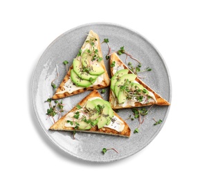 Photo of Plate of tasty toasts with avocado, sprouts and chia seeds on white background, top view