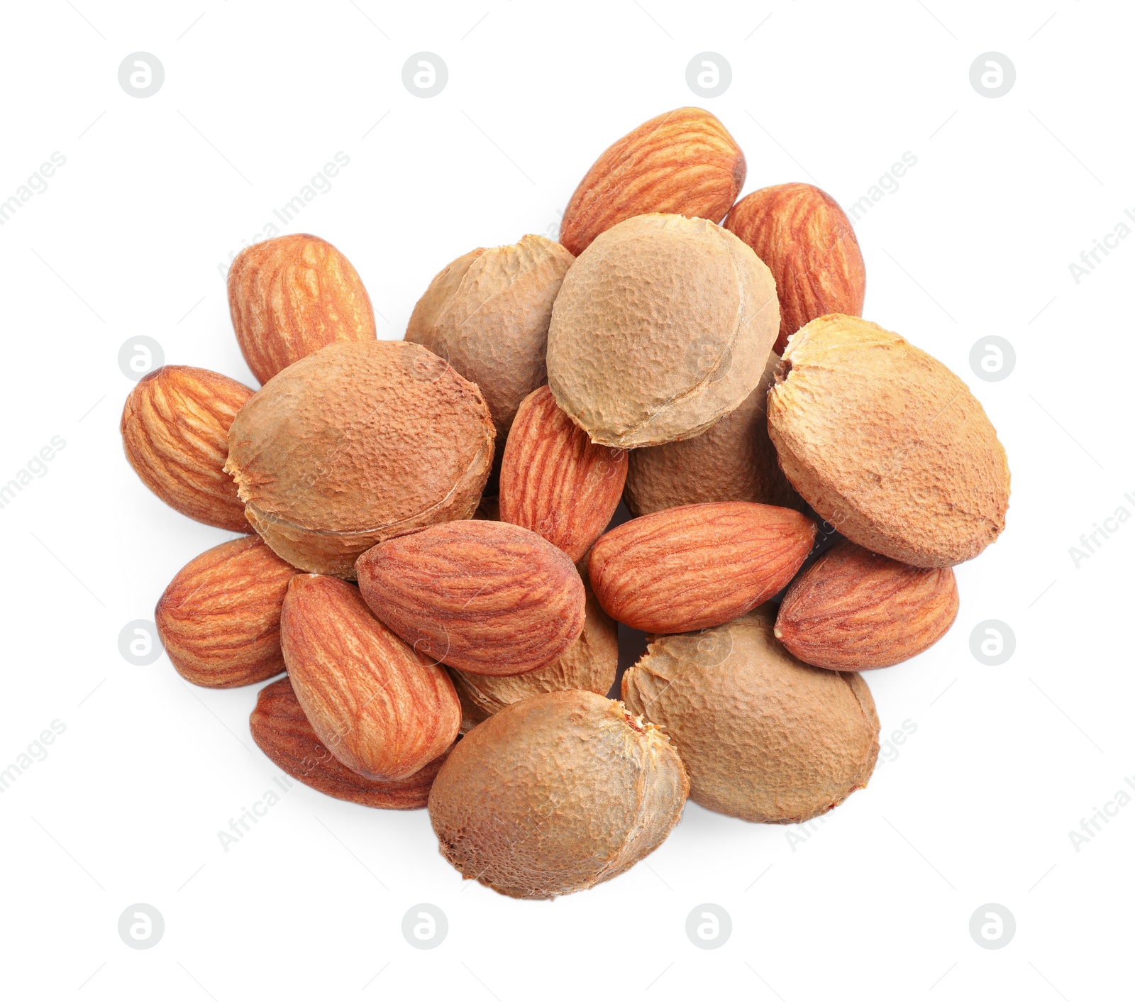 Photo of Organic dried apricot kernels on white background, top view