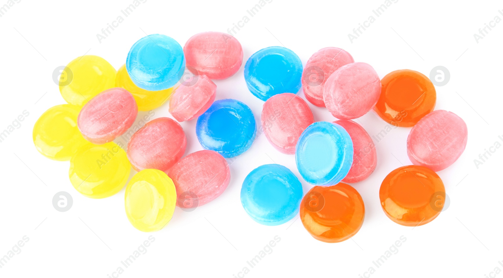 Photo of Many different colorful cough drops on white background, top view