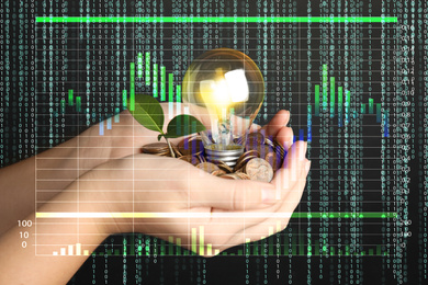 Image of Woman with coins, light bulb and green plant against black background, closeup. Energy saving