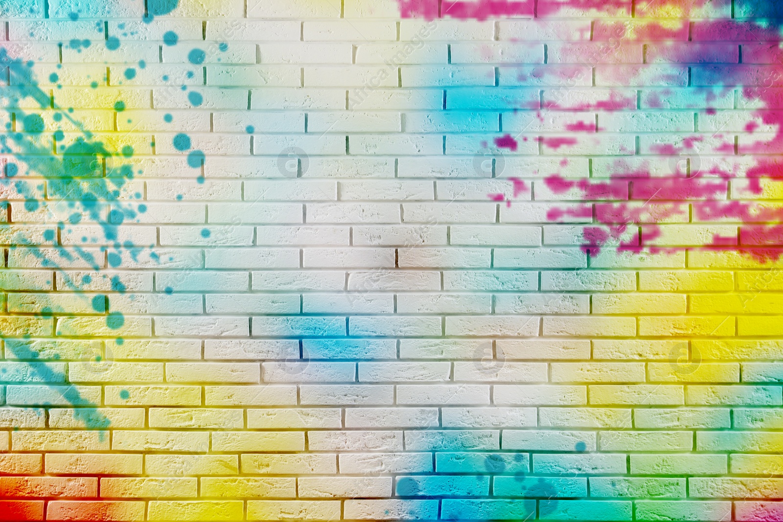 Image of Abstract colorful graffiti drawn on white brick wall