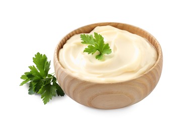 Photo of Bowl with delicious mayonnaise and parsley on white background