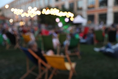 Blurred view of open air cinema. Bokeh effect