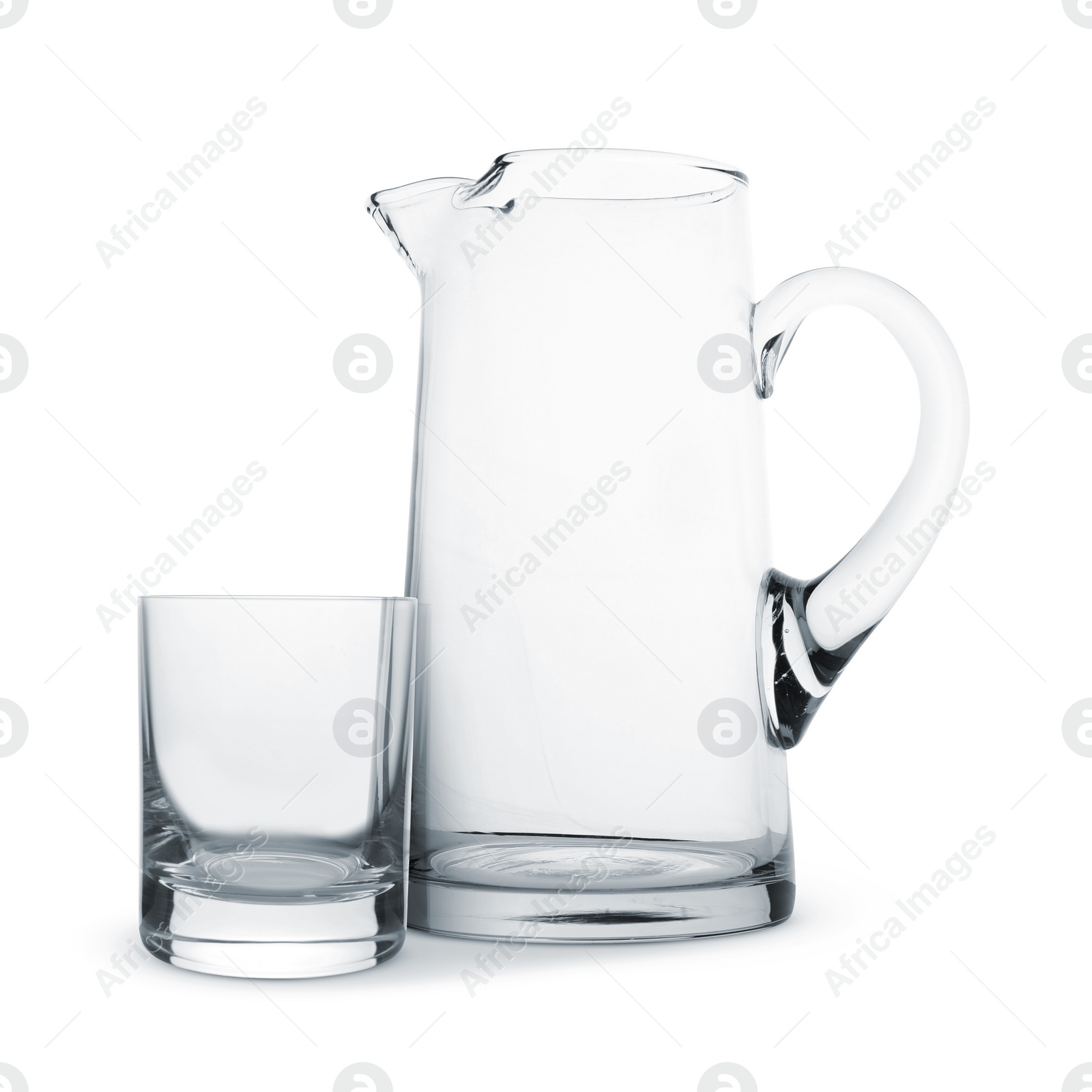 Image of Empty glass and jug isolated on white