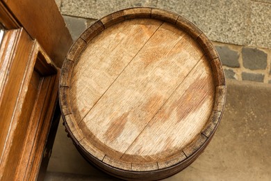 Traditional wooden barrel outdoors, top view. Wine making