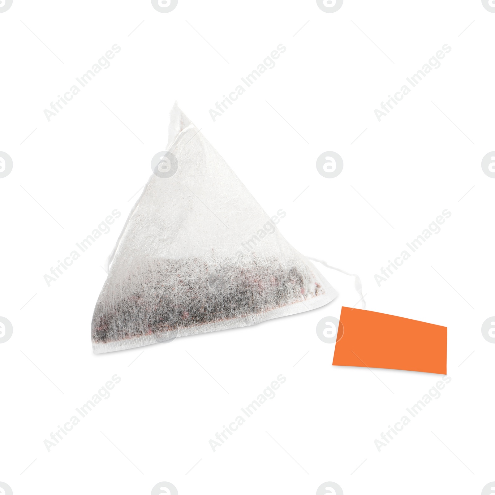 Photo of New pyramid tea bag isolated on white