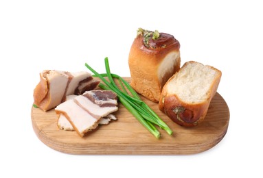 Photo of Board with delicious pampushky (buns), salo and green onions isolated on white