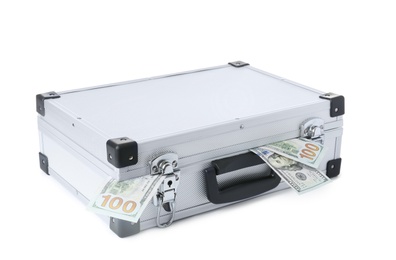 Hard case full of money on white background