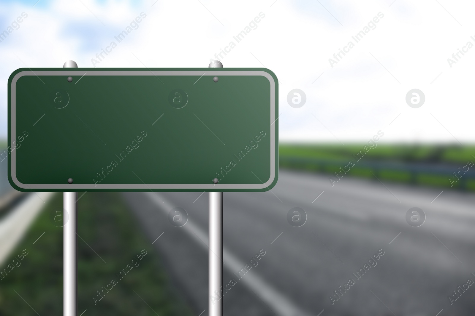 Image of Blank green road sign on empty asphalt highway, space for text
