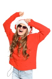 Photo of Happy young woman listening to Christmas music on white background