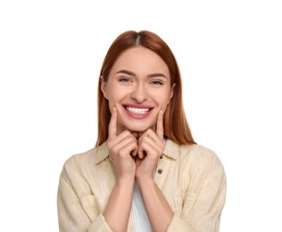 Beautiful woman showing her clean teeth and smiling on white background