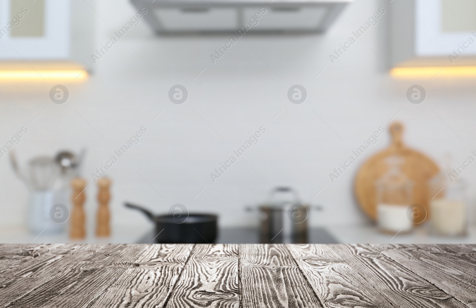 Image of Wooden table in light kitchen. Space for design