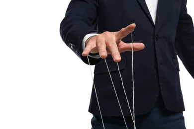 Photo of Man in suit pulling stringspuppet on white background, closeup