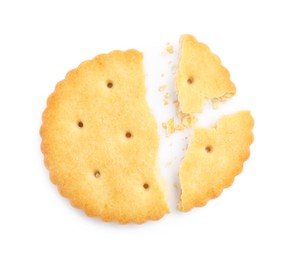 Photo of Crispy broken cracker isolated on white, top view