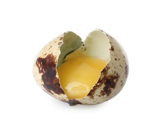 One cracked quail egg isolated on white