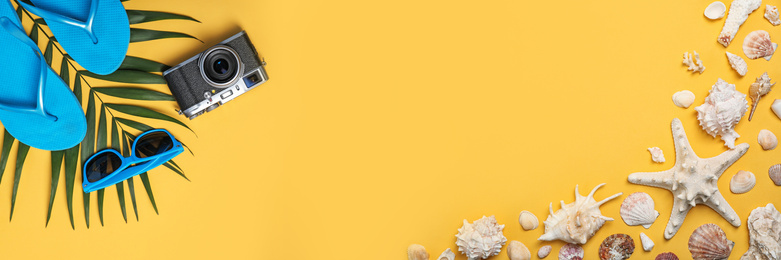 Image of Flat lay composition with collection of beach objects on yellow background, space for text. Banner design