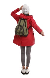 Photo of Woman with backpack on white background, back view. Winter travel