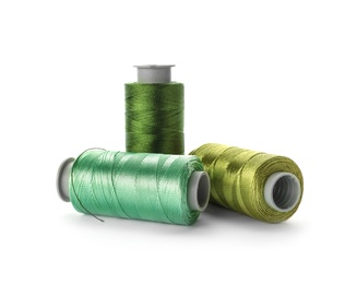 Color sewing threads on white background