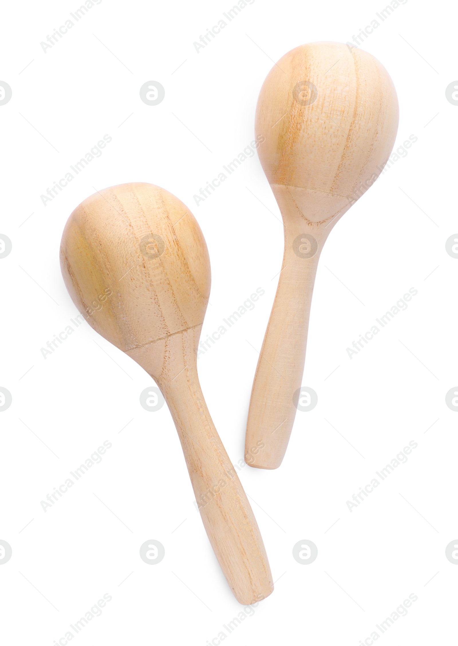 Photo of Wooden maracas isolated on white, top view. Musical instrument