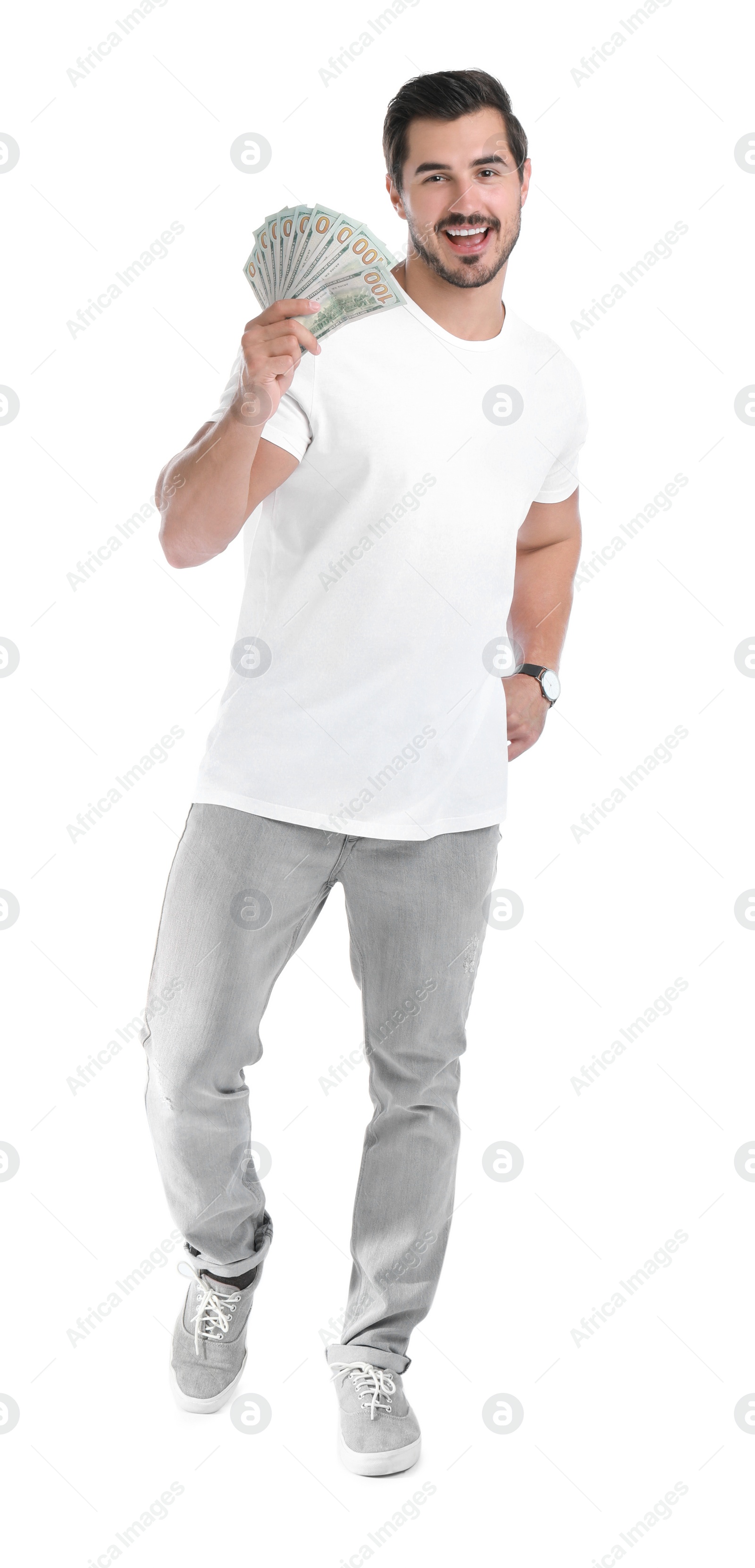 Photo of Handsome young man with dollars on white background