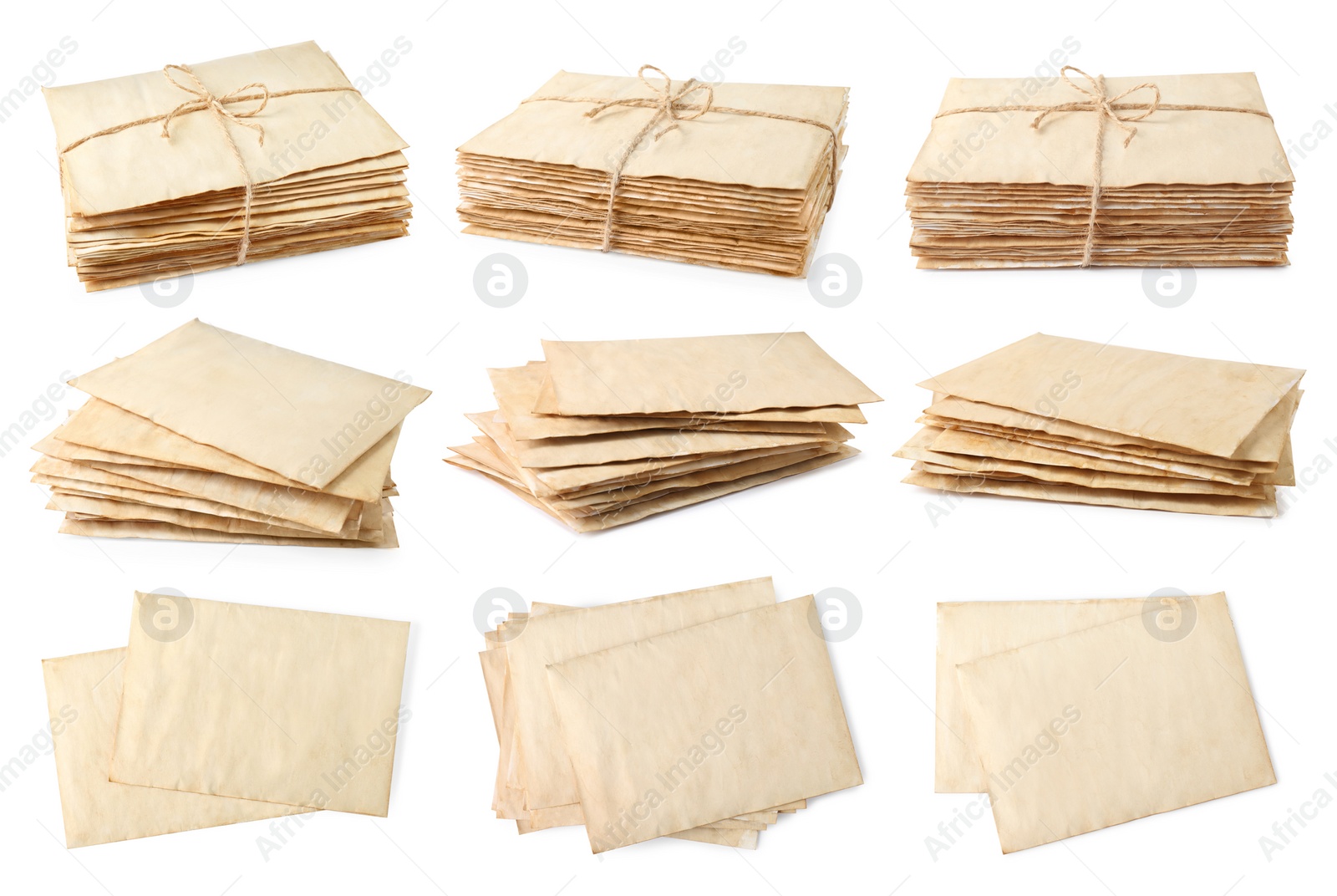 Image of Set with stacks of old letters on white background