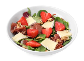 Tasty salad with brie cheese, prosciutto, strawberries and walnuts isolated on white