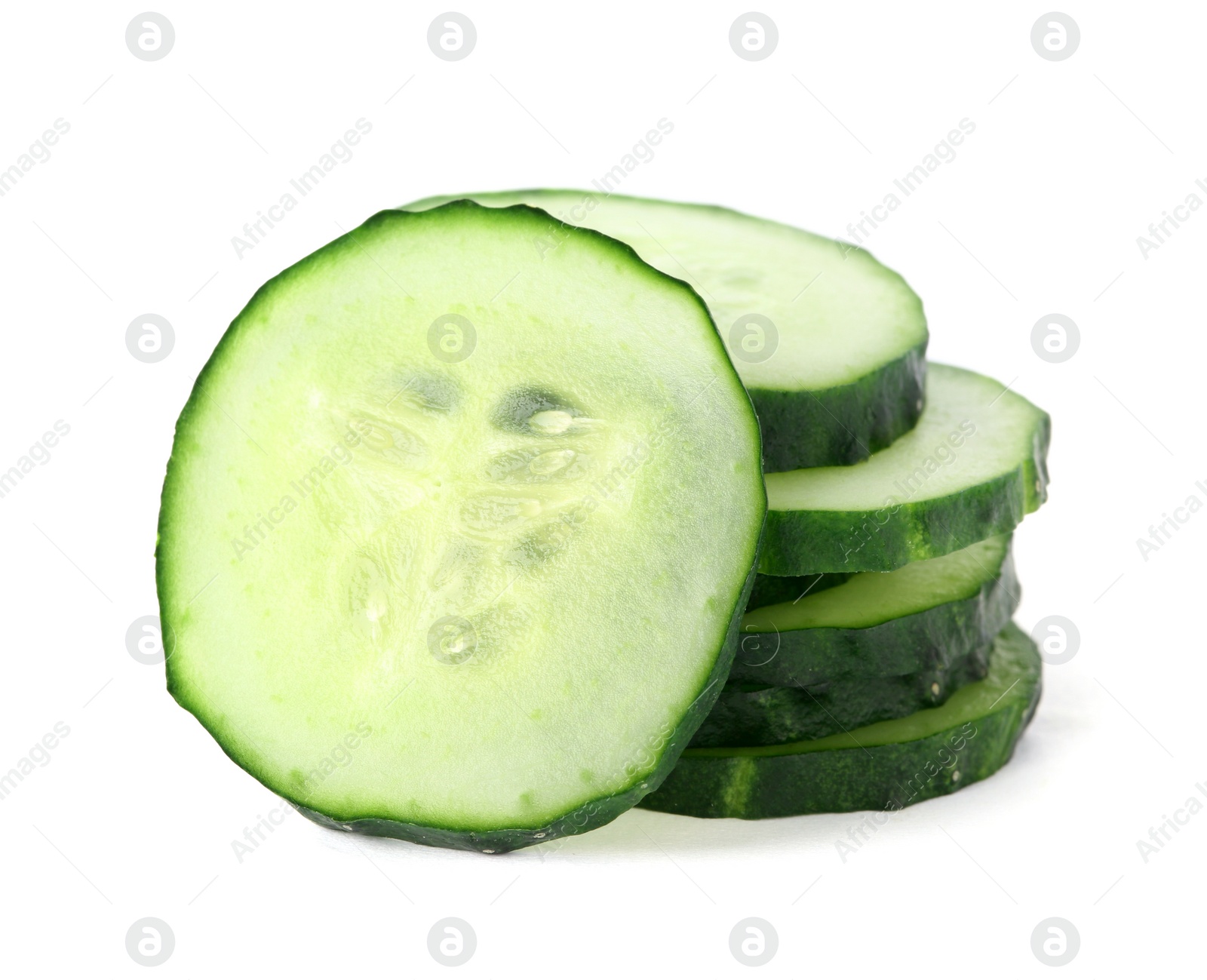 Photo of Slices of fresh cucumber on white background