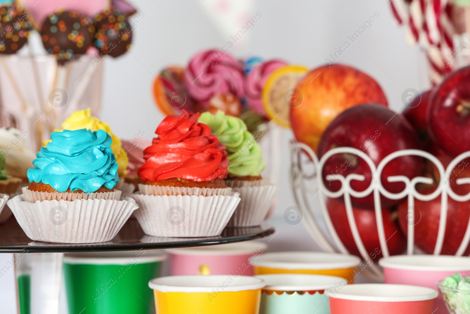 Photo of Candy bar with delicious treats for birthday party, closeup