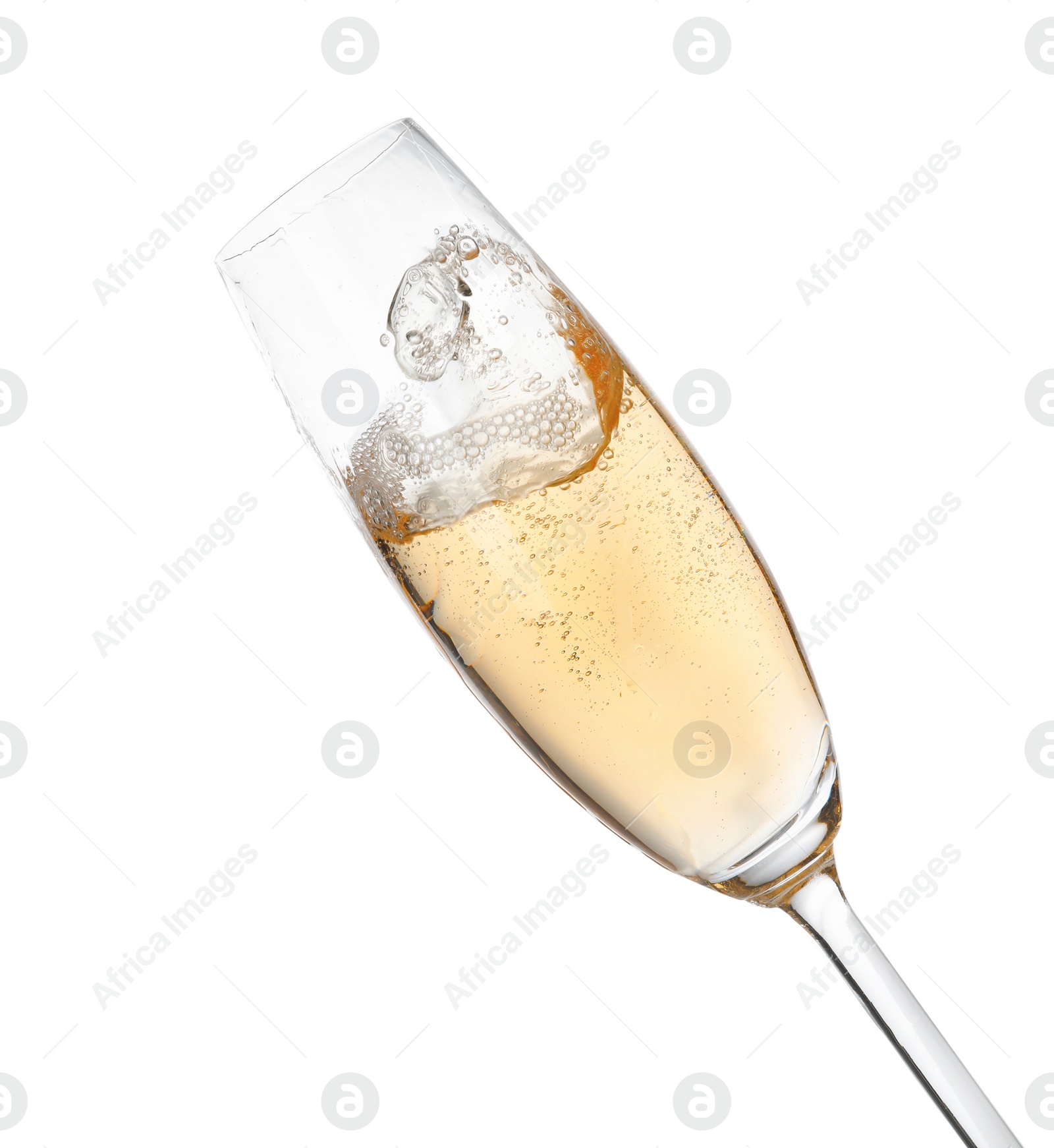 Photo of Glass of champagne on white background. Festive drink