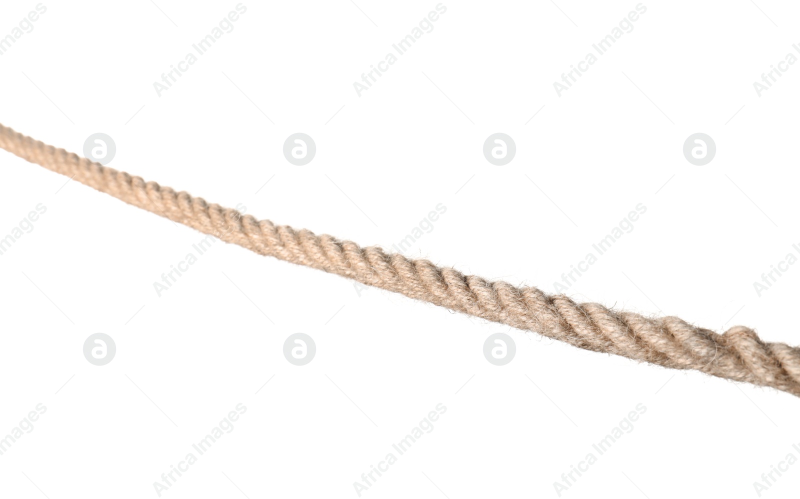 Photo of Strong nautical cotton rope on white background