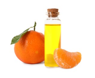 Photo of Aromatic tangerine essential oil in bottle and citrus fruit isolated on white