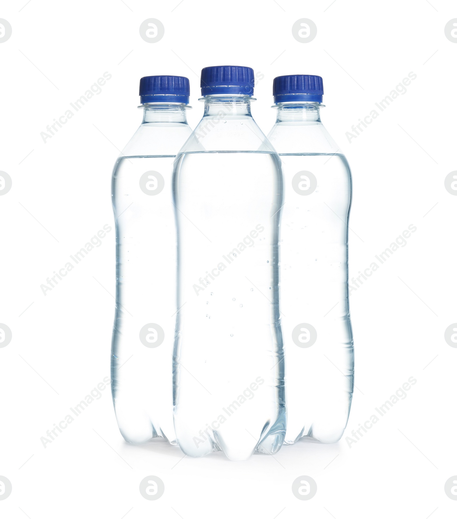 Photo of Plastic bottles with pure water on white background