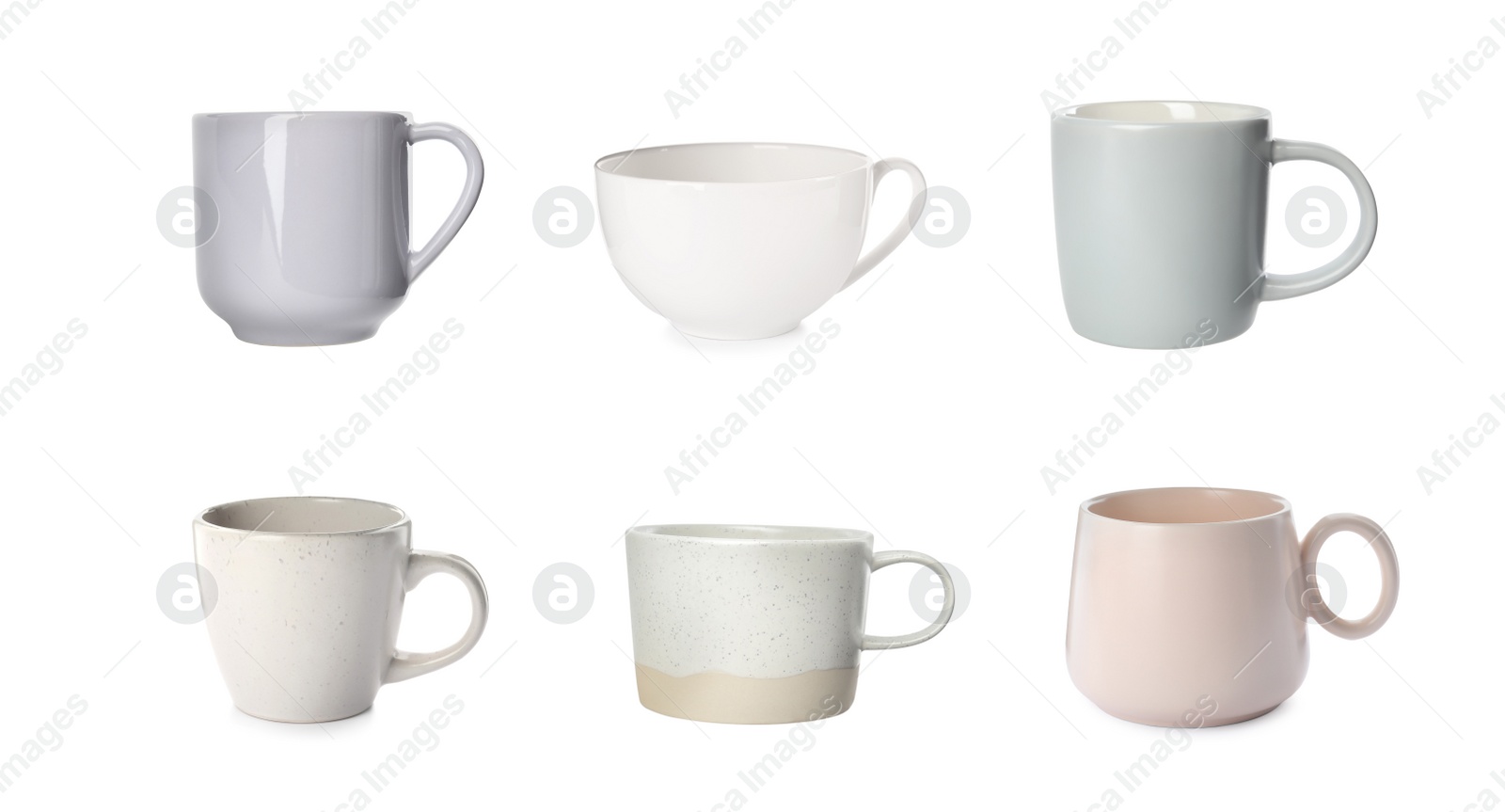 Image of Set with different beautiful cups on white background