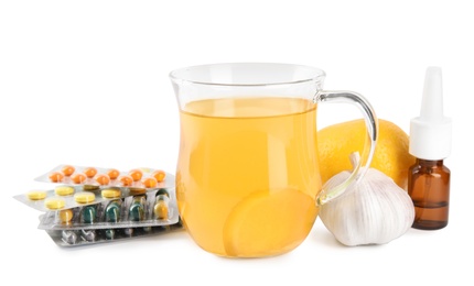 Photo of Composition with cold remedies on white background. Sore throat treatment