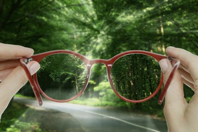 Image of Vision correction. Woman looking through glasses and seeing forest clearer