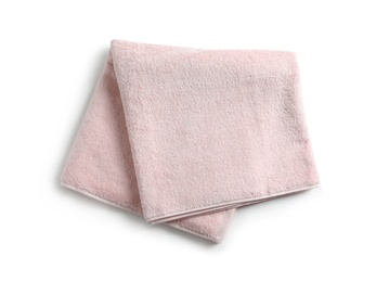 Photo of Folded soft terry towel on white background, top view