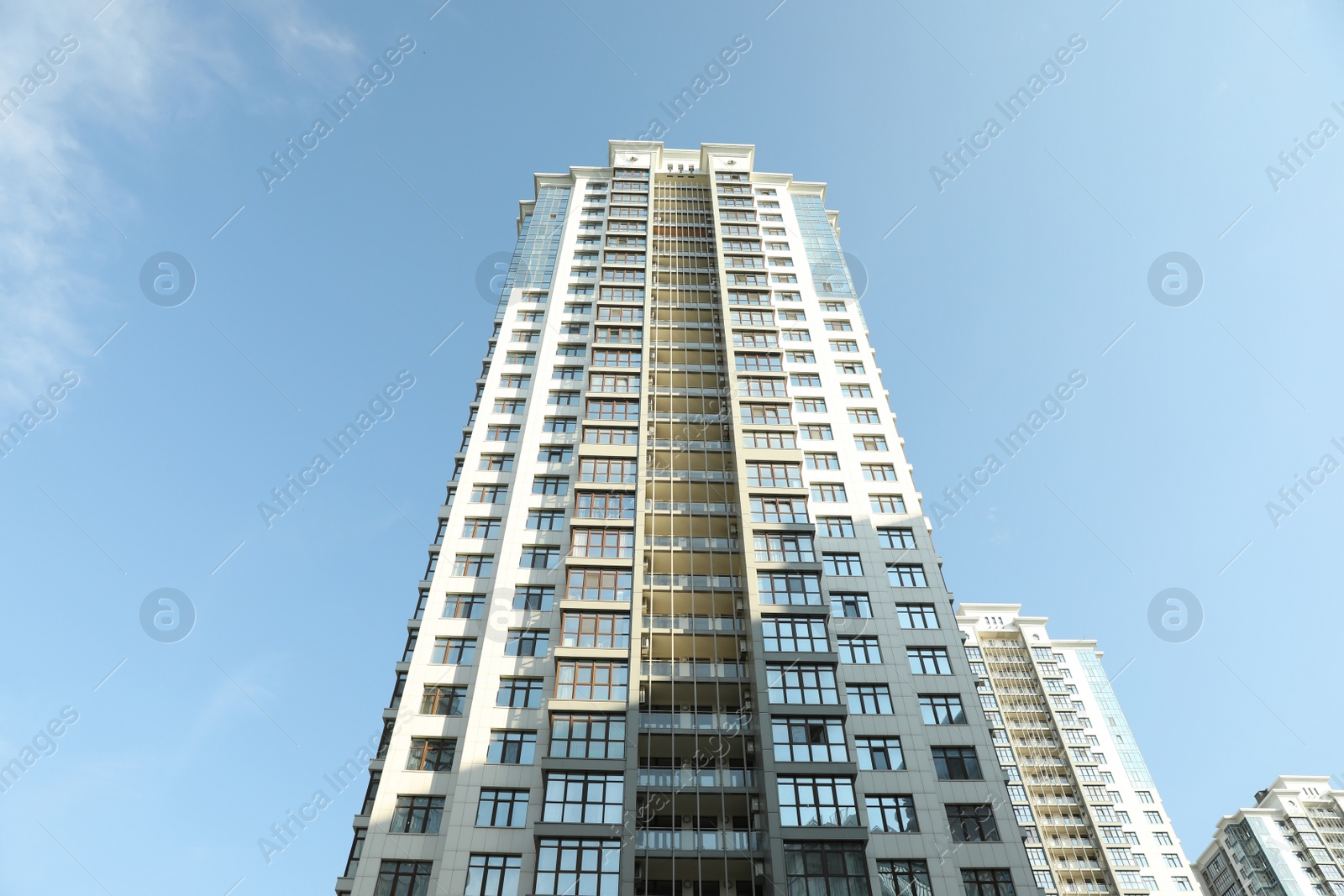 Photo of KYIV, UKRAINE - MAY 21, 2019: Beautiful view of modern housing estate in Pecherskyi district on sunny day, low angle