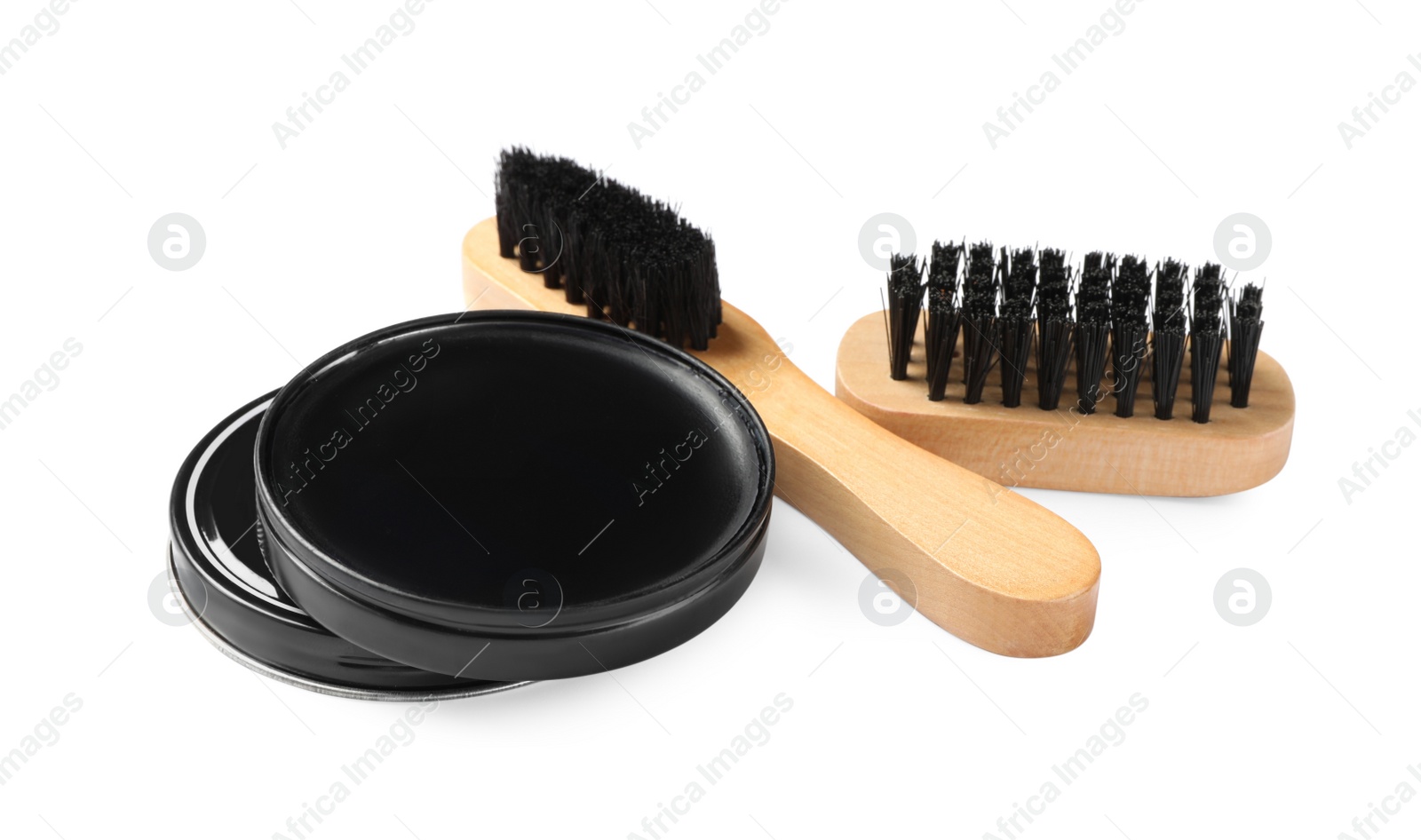 Photo of Shoe care accessories on white background. Footwear clean item