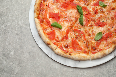 Delicious pizza Margherita on light grey table, top view