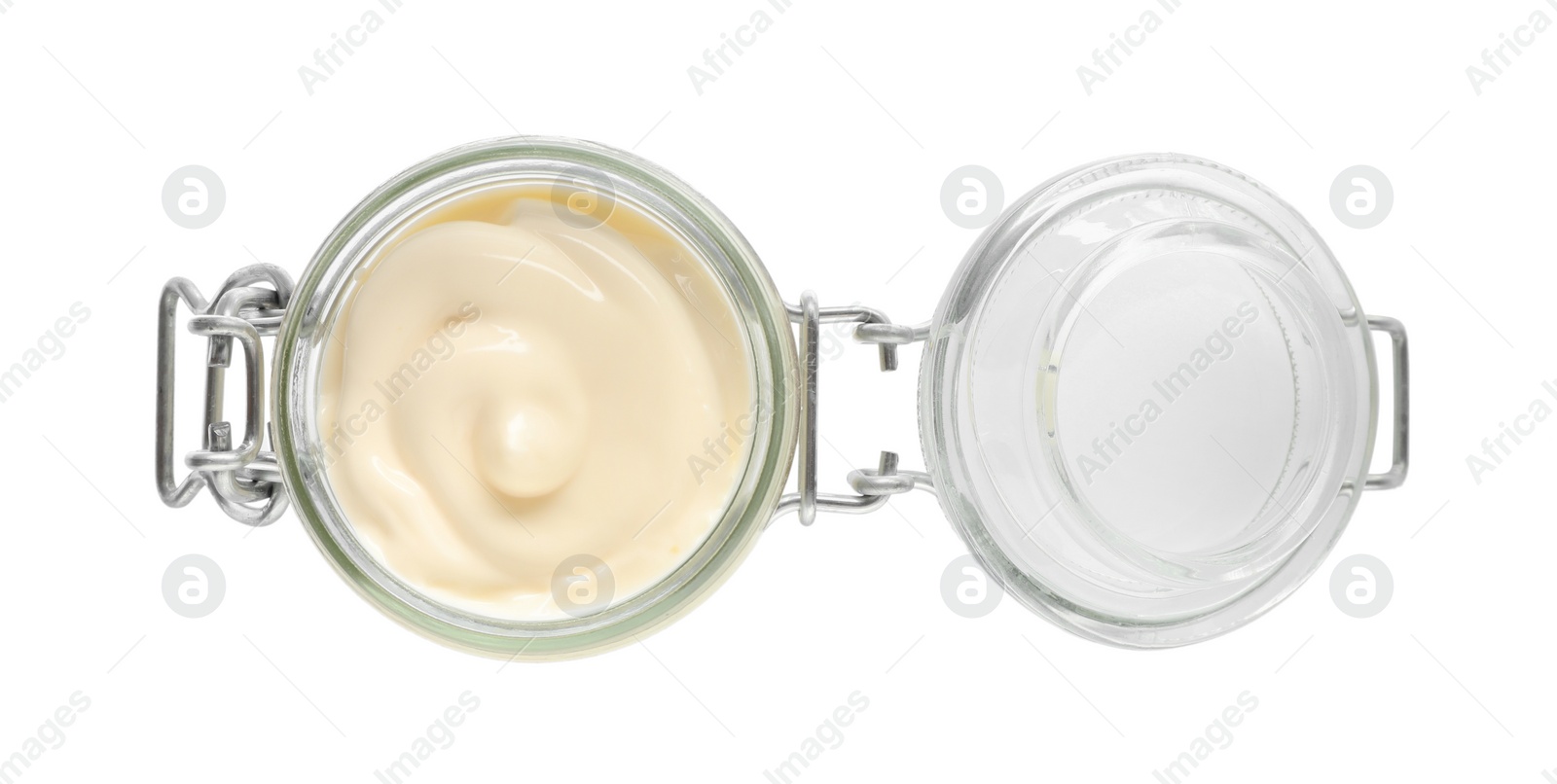 Photo of Mayonnaise in glass jar isolated on white, top view