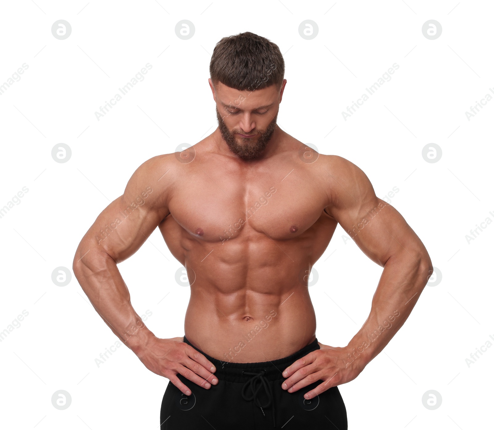 Photo of Young bodybuilder with muscular body on white background