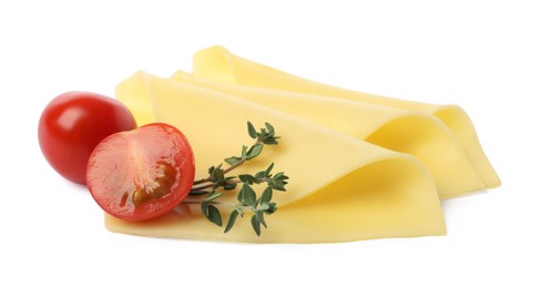 Photo of Slices of tasty fresh cheese, tomatoes and thyme isolated on white