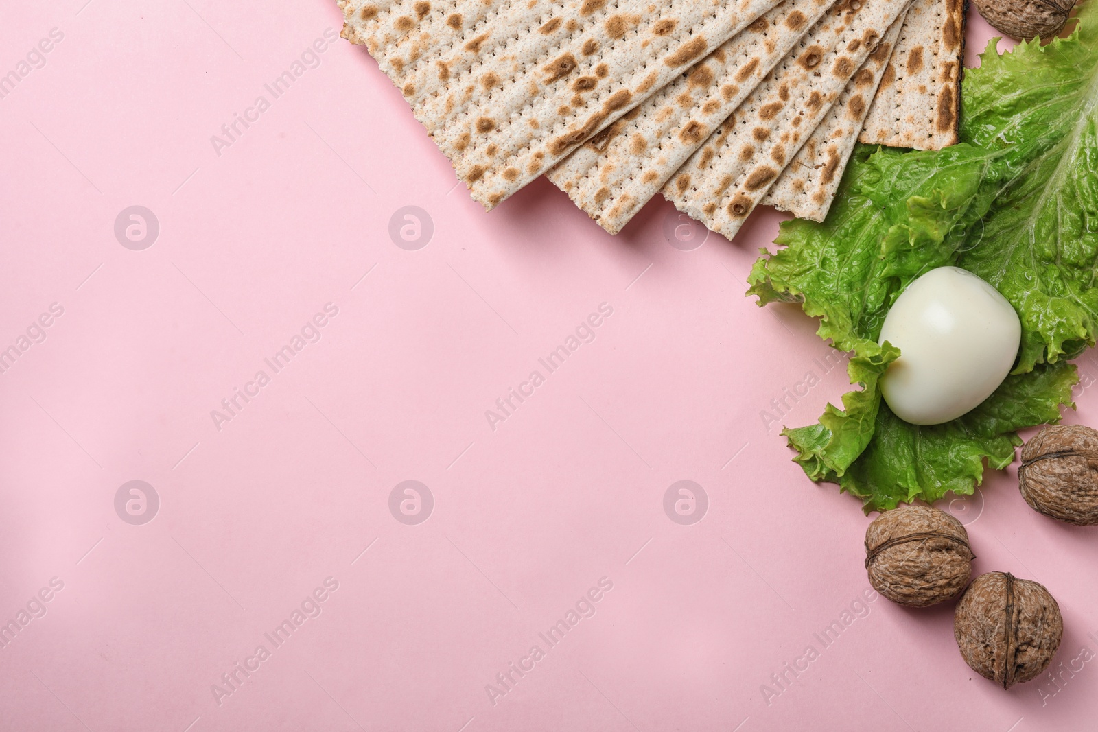 Photo of Flat lay composition with matzo and space for text on color background. Passover (Pesach) Seder