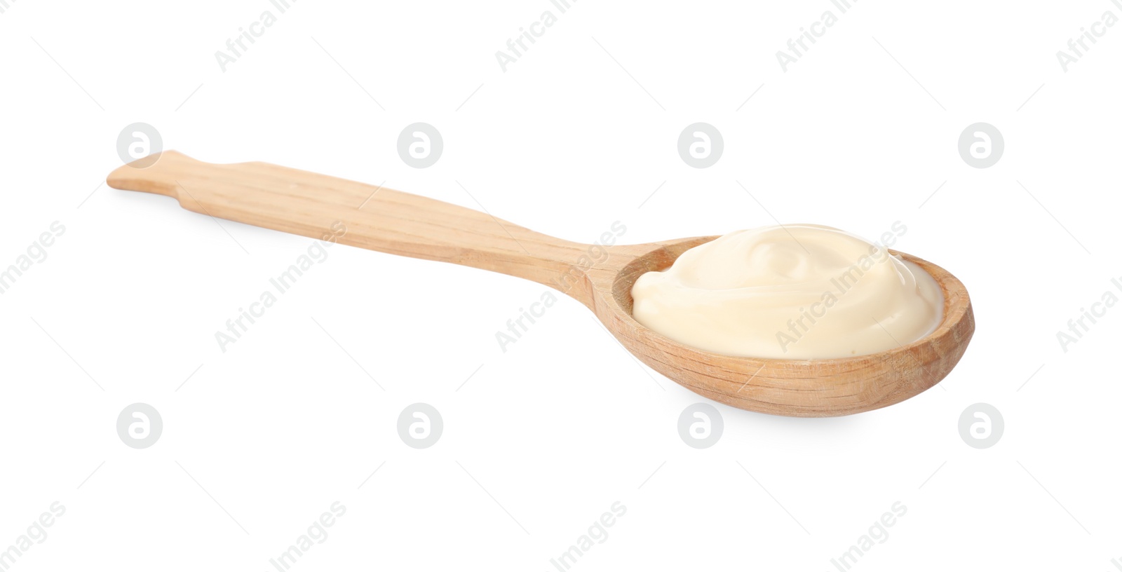 Photo of Wooden spoon with tasty mayonnaise isolated on white