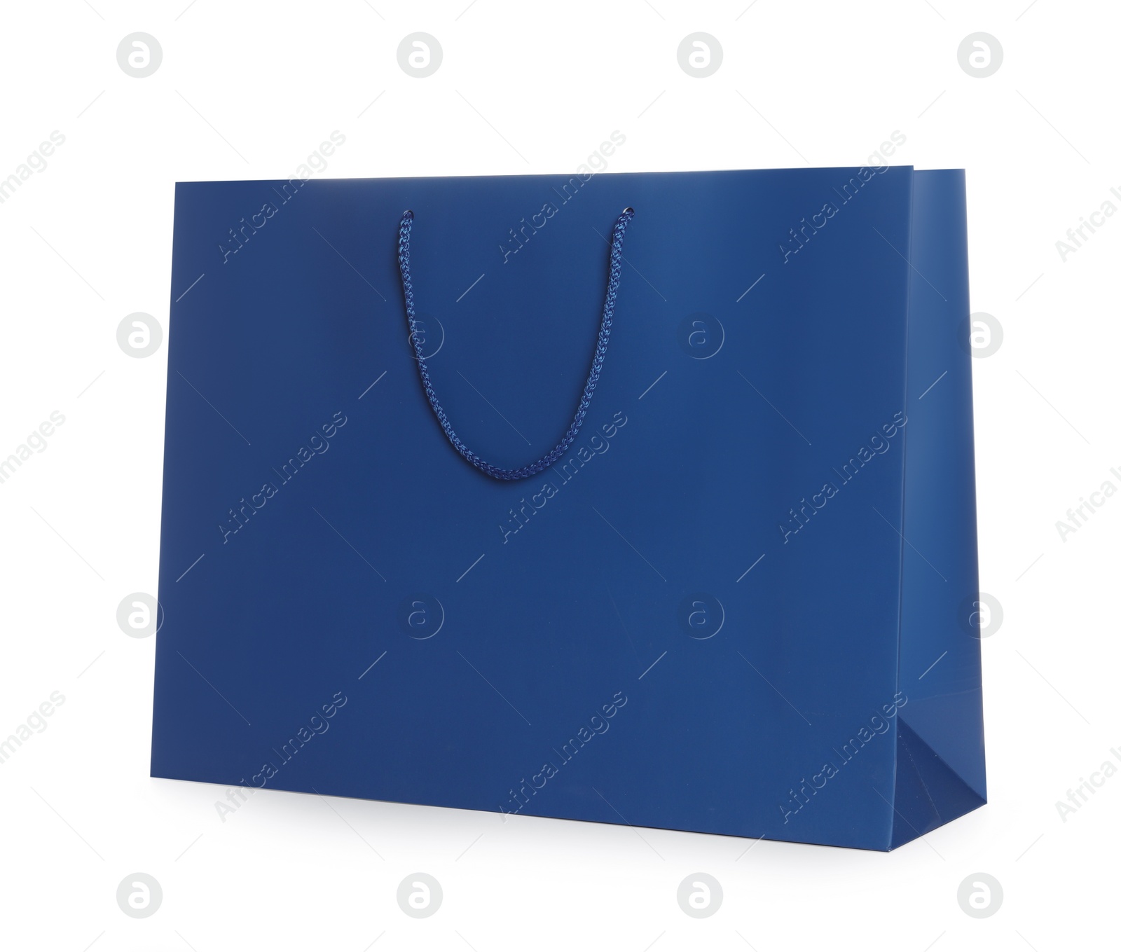 Photo of One blue shopping bag isolated on white