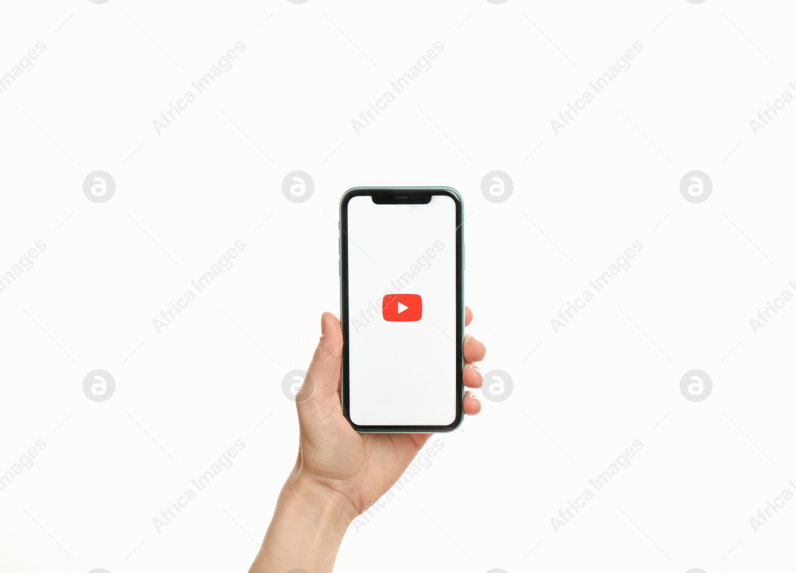 Photo of MYKOLAIV, UKRAINE - JULY 9, 2020: Woman holding  iPhone X with Youtube app on white background, closeup