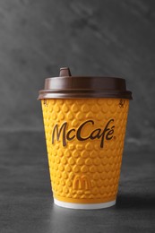 MYKOLAIV, UKRAINE - AUGUST 12, 2021: Hot McDonald's drink on grey table